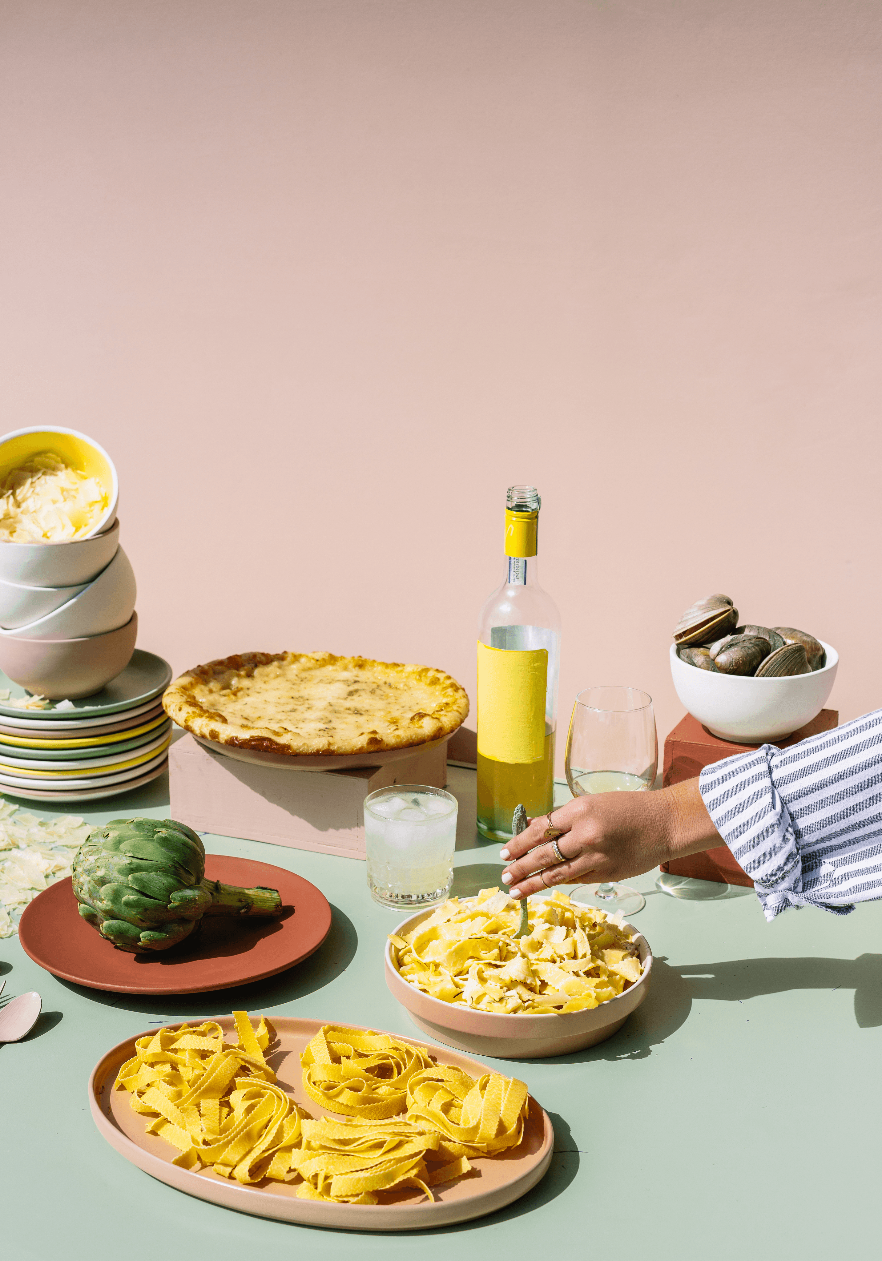 Friends sharing plates of food around a table