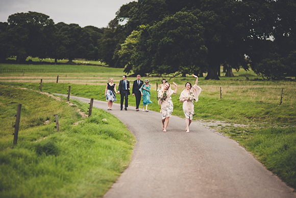 Bridemaids-walking-down-country-lane Boconnoc