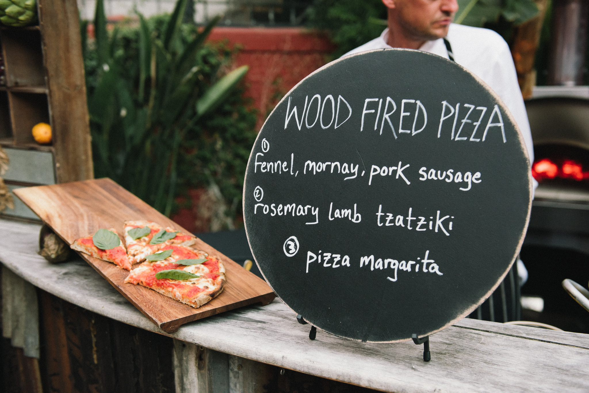 woodfire pizza picture The Holding Company