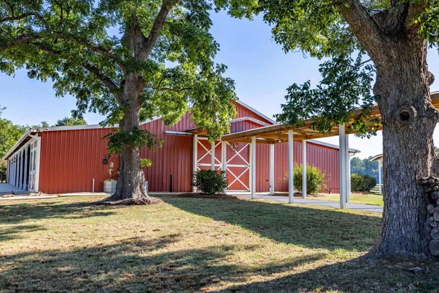 barn-wedding-exterior-side-breezeway The Farm at Wolf Creek