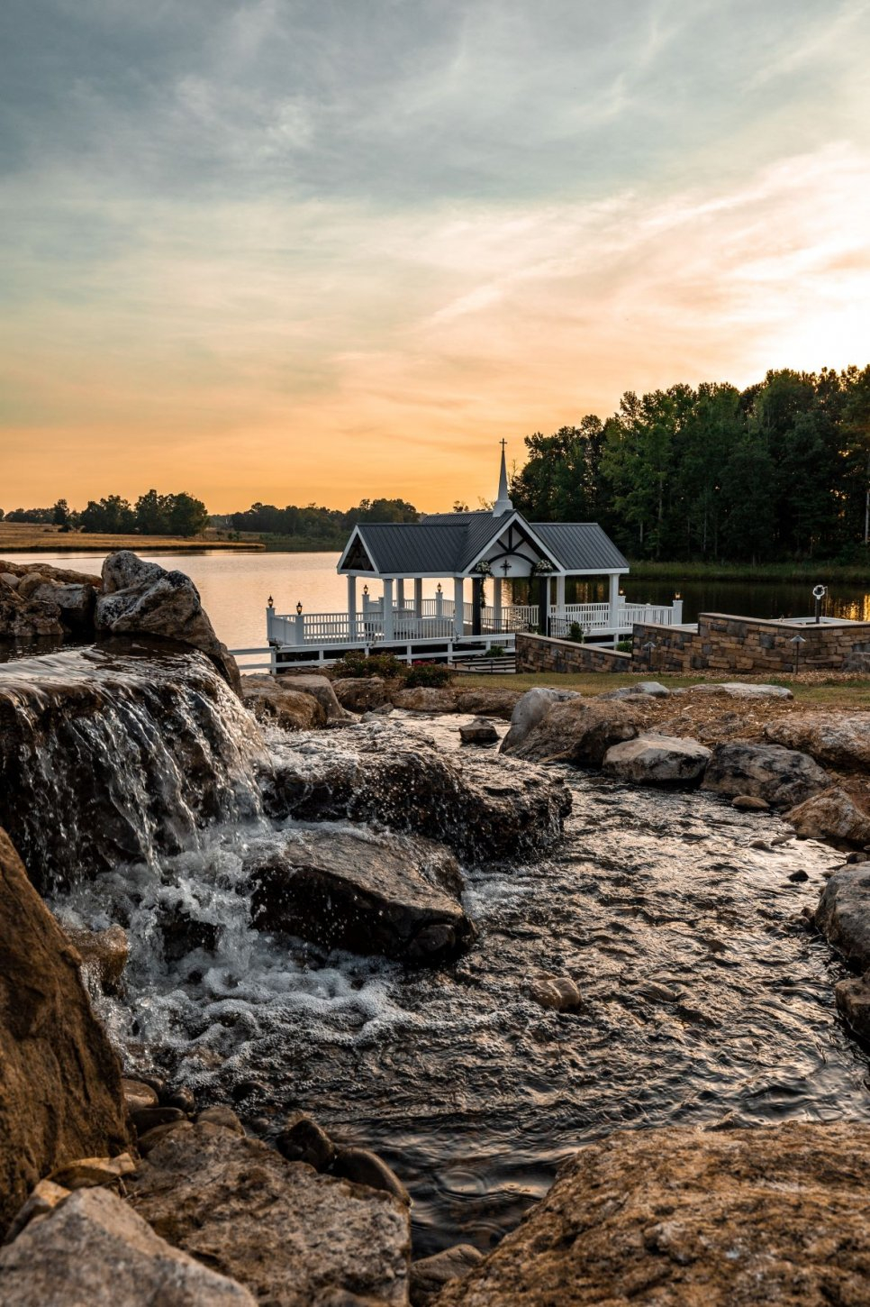 waterfront-ceremony-outdoor-chapel-waterfall-sunset The Farm at Wolf Creek