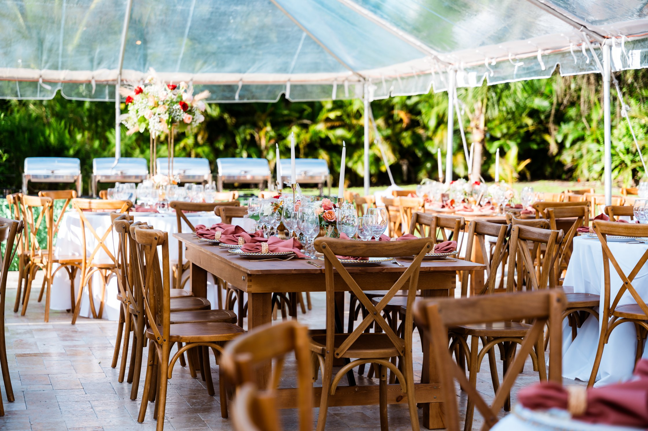 clear-top-tent-wedding-reception-rustic-wood-tables-south-florida Saint Patrick Palace