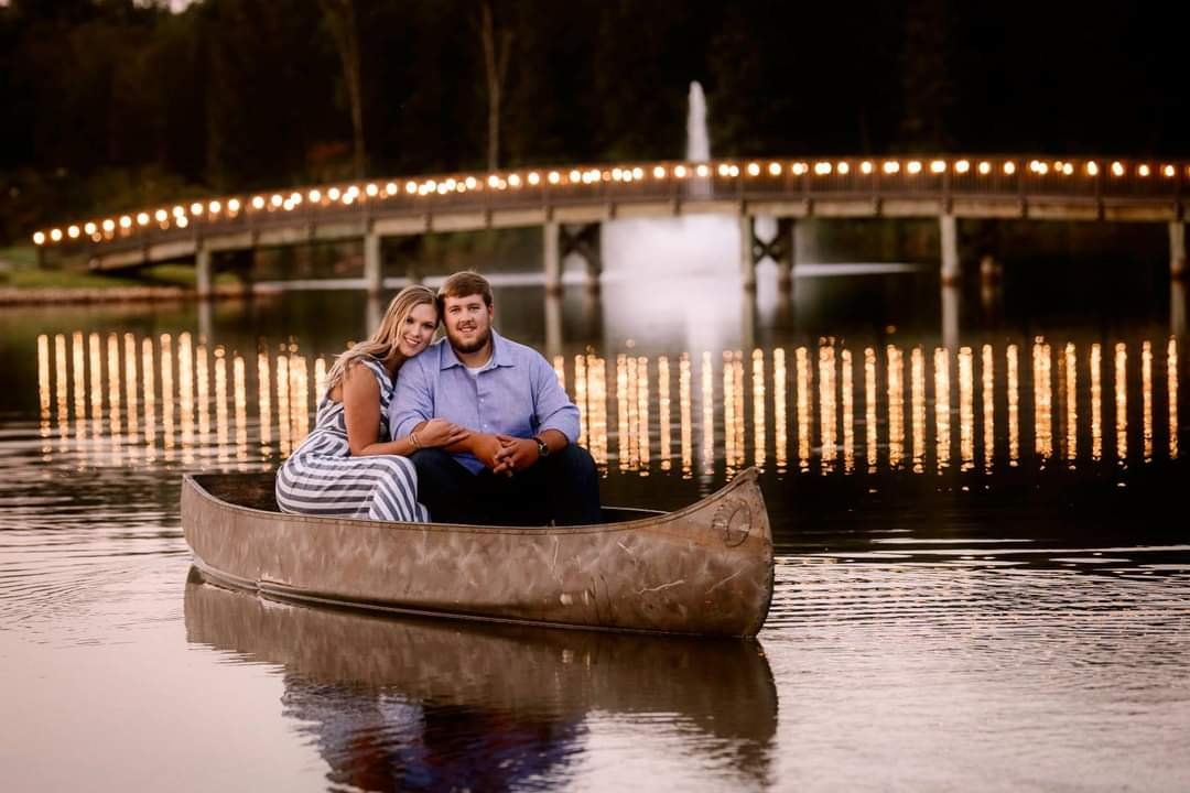 Engagement phoot at the lake by bridge Sandy Creek Farms