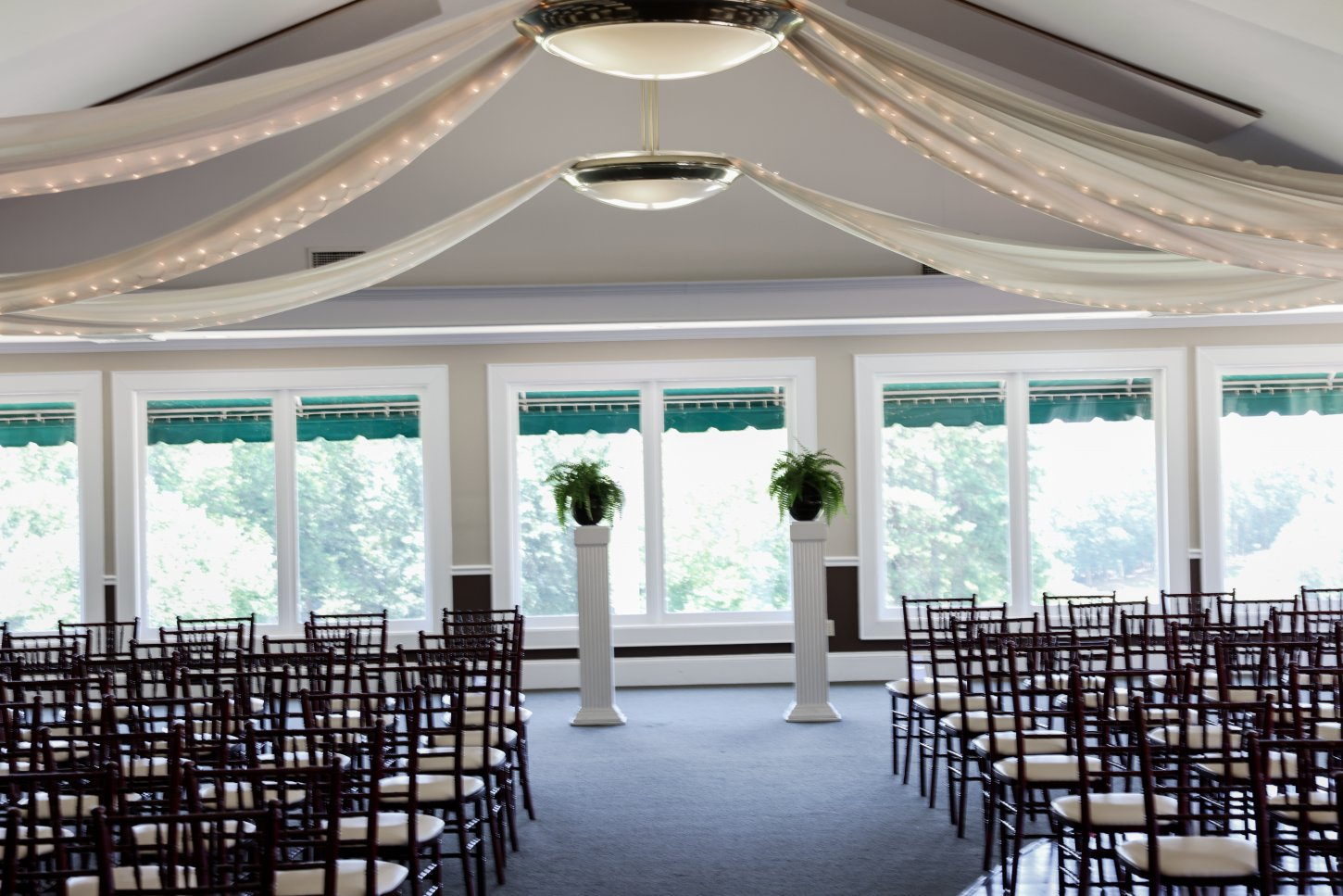indoor ceremony Holly Tree Country Club
