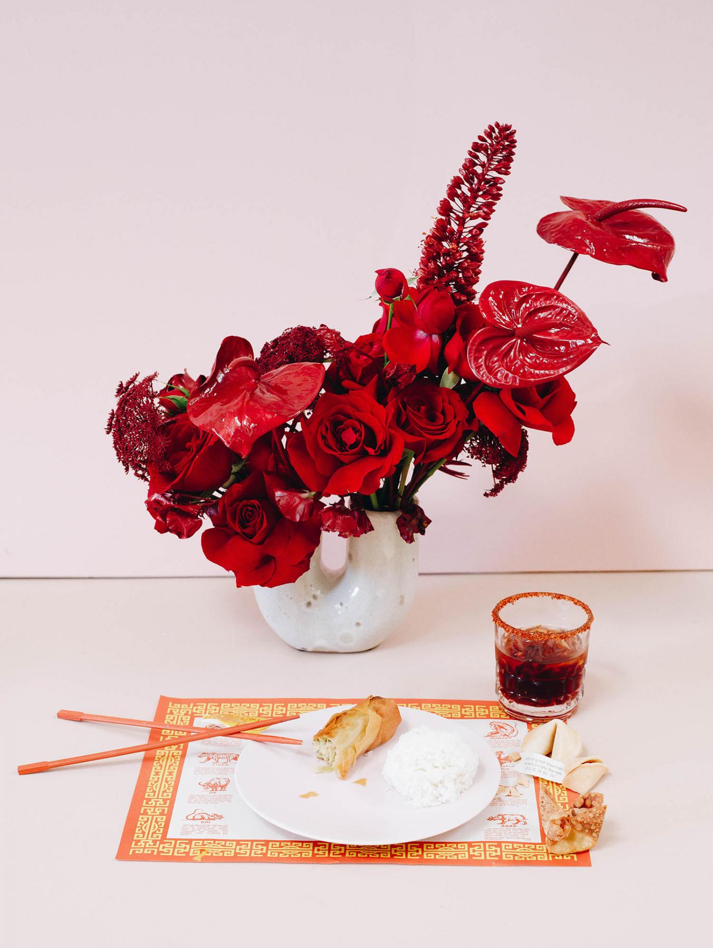 chinese egg roll with drink and florals