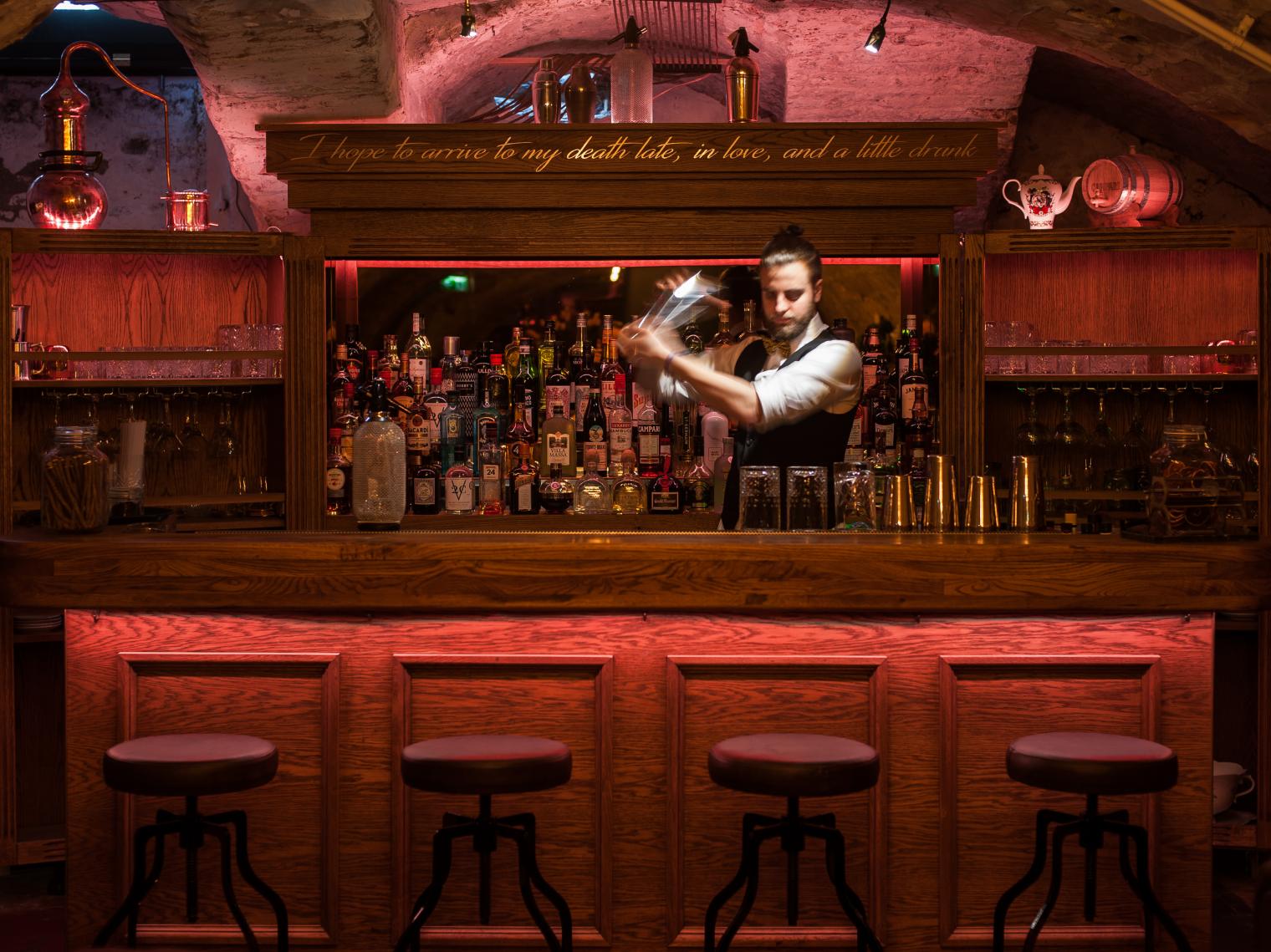 The Barbershop Cuts and Cocktails in Vegas Has a Secret Speakeasy With an  Amazing Whisky Selection